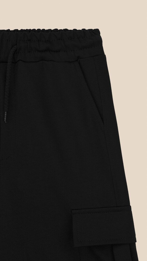 Спортивні шорти однотонні для хлопчика LAWA BBC02329 134 см Чорний shop (2000999217920)  Фото №0