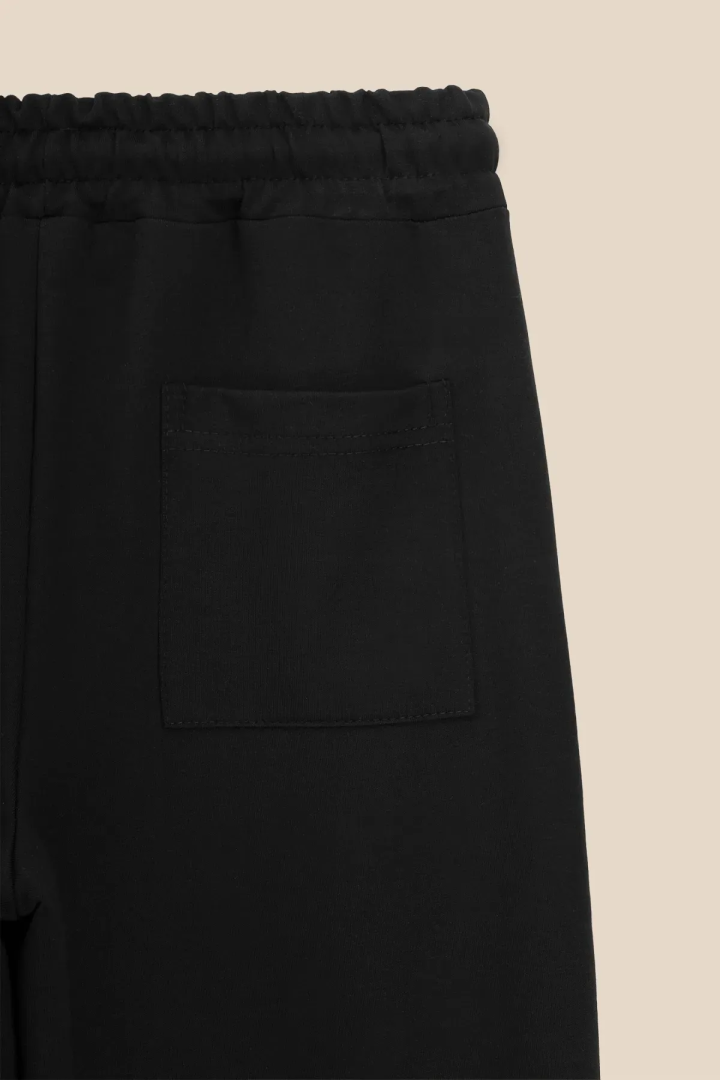 Спортивні штани однотонні для хлопчика LAWA BBC02324 140 см Чорний shop (2000999173424)  Фото №1