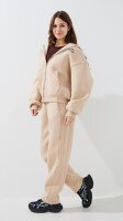 Спортивні штани банани однотонні жіночі LAWA WTC02459 XS Бежевий shop (2000999388316)  Фото №1