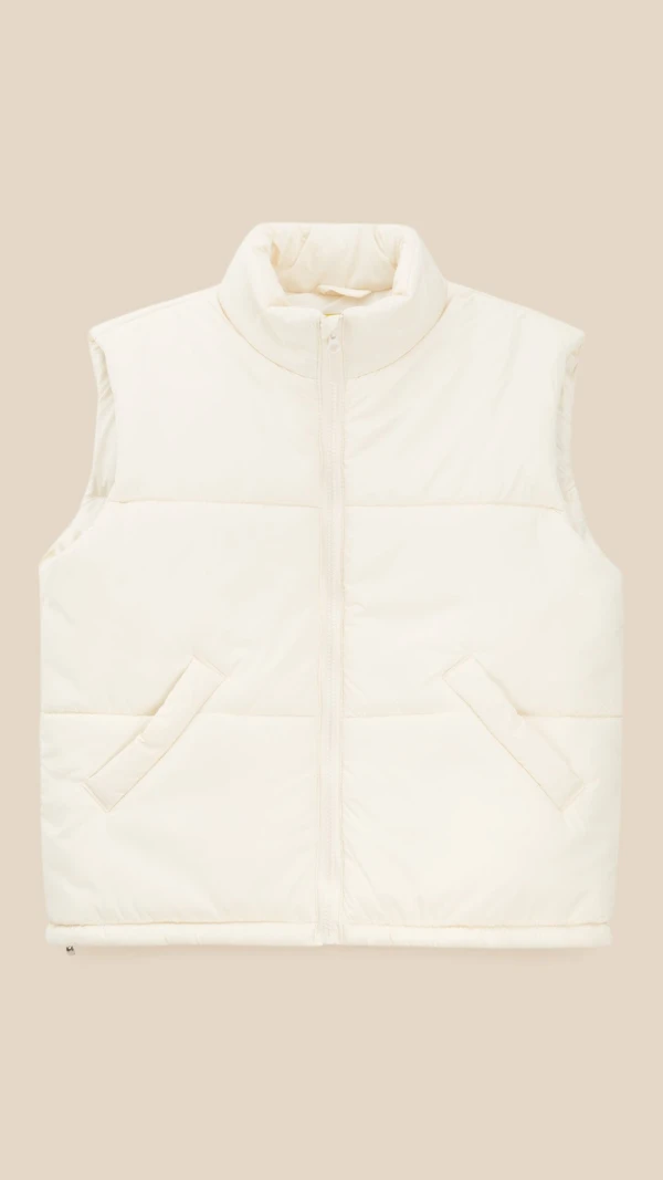 Жилет однотонний для дівчинки LAWA GBC02364 134 см Молочний shop (2000999519802)  Фото №0